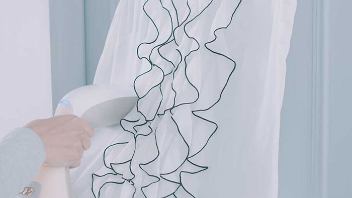 Come stirare a vapore tessuti delicati